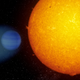 Artist’s depiction of WASP-69b and its ghostly tail.